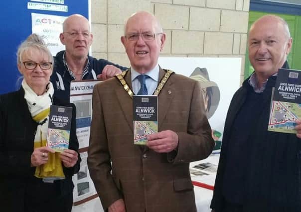 Members of Alnwick Chamber of Trade with Alnwick Mayor Alan Symmonds with the Good Food Guide.