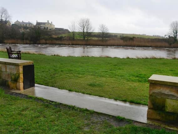 The flood wall at Warkworth, along the bank of the River Coquet.