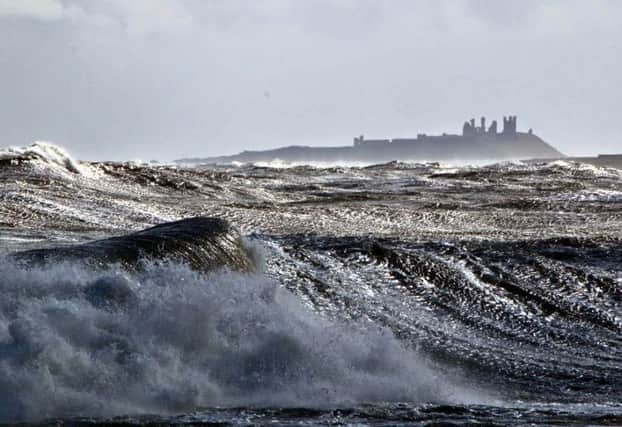A stormy day at Beadnell, with this spectacular view of Dunstanburgh Castle through the waves. Strong winds but worth it, says David Simpson, a member of our Northumberland Camera Club. Â·