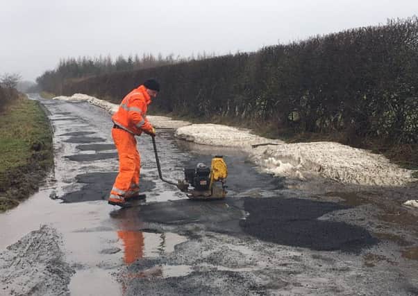 Pothole filling in north Northumberland.