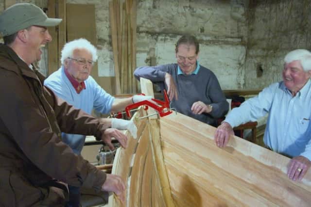 Village of the Year judge Alex Langlands with members of Bamburgh and Beadnell Community Rowing Club. Picture courtesy of Channel 4