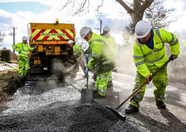 The patching process being carried out by Northumberland County Council operatives.