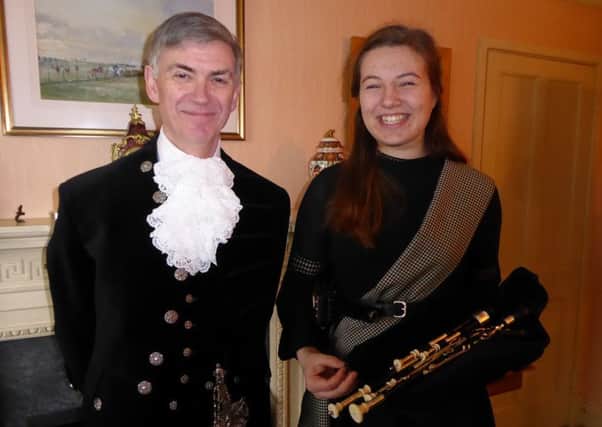 The new High Sheriff of Northumberland, Michael Orde, with Issy Maxwell, his piper for his shrieval year.