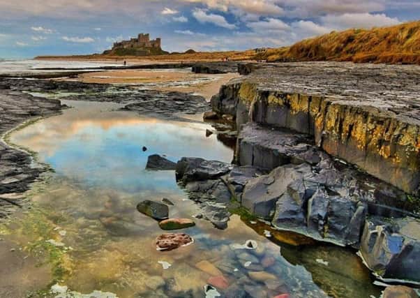 FIRST: After a snowy start to Easter Day, it turned out lovely at Bamburgh. Picture by Tony Robson