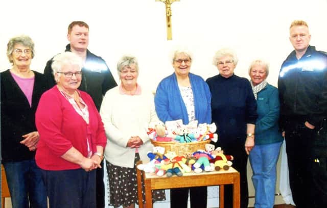 Trauma teddies were presented to Wooler police by the local knit and natter group which is an off shoot of Roddam WI.
We meet on a Tuesday in the Parish Room at St Mary's Church, Wooler.
From left to right: Anne Hume, Alfreda Hindmarsh, Sgt Will Munro, Jennifer Scott, Janet Laycock, Betty Ashworth, Doreen Smith and PC Curtis Richie.