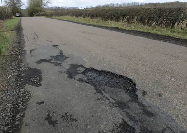 Pothole on the Longframlington to Newton on the Moor road.