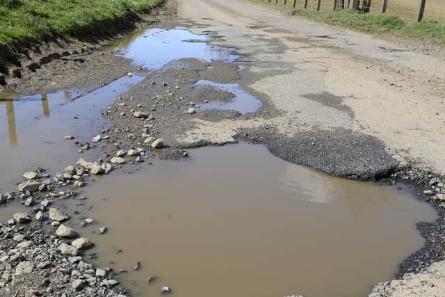 Pothole on the A697 to North Middleton Road, south of Wooler.