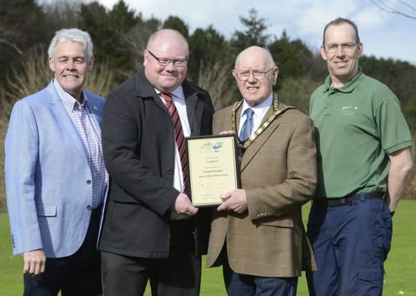 Tim Kirton, Projects and Funding Officer at Alnwick Town
Council, Andrew McGuinness, Regional Manager, Confederation of
Passenger Transport, Alnwick Mayor Alan Symmonds and Alnwick Garden CEO Mark Brassell at the presentation of the Coach Friendly certificate.
 Picture by Jane Coltman