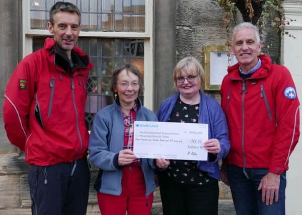 From left: Iain Nixon (NNPMRT team leader), Ros Allen (Rothbury WI president), Caroline Dawson (chairman of the parish council) and Andrew Miller (NNPMRT member).