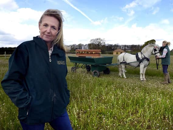 Belsay Woodland Burial Ground owner Laura de Wesselow, left. Also included in the picture is pony Sam pulling the coffin cart. Picture by Jane Coltman.