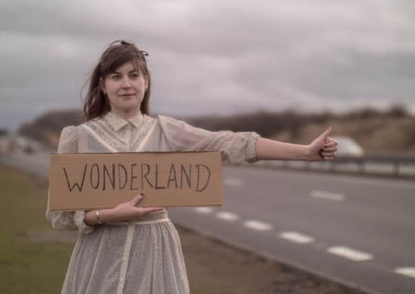 Julie Egdells film premiere of her Alice in Wonderland collection.