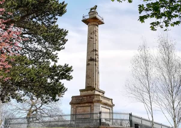 The 25m Greek Doric column is guarded by four couchant lions and topped by a Percy lion passant, with characteristic straight tail.