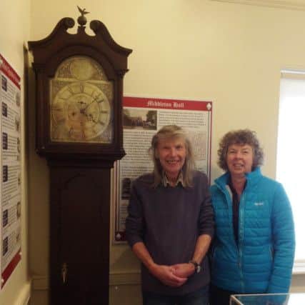 The William Clark longcase clock, with Eric Robson and Karon Ives, chairman of Belford Museum committee.