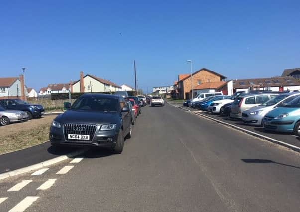 Cars parked in Beadnell over the May Day bank-holiday weekend.