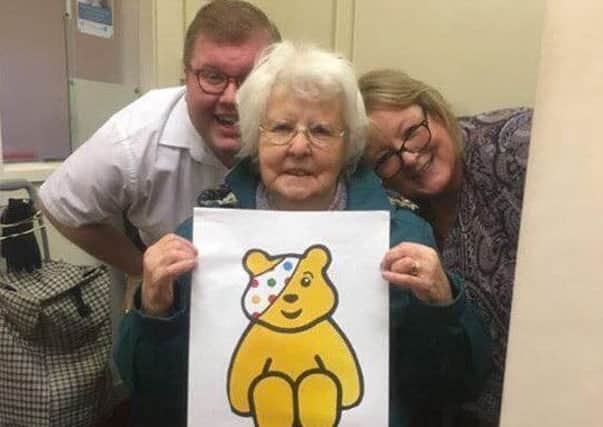Coun Scott Dickinson, Coun Alice Charlton and Rose Hudspith celebrate the Children in Need funding boost.
