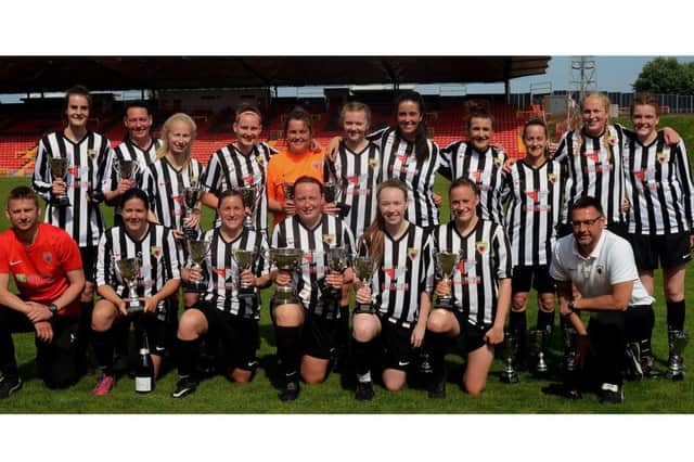 Alnwick Ladies celebrate their cup final win. Picture by Steve Miller