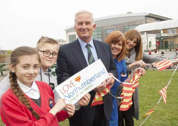 Coun Glen Sanderson visits Newsham Primary School to view their work, which contributed to them gaining a runner-up award at last year's LOVE Northumberland Award.