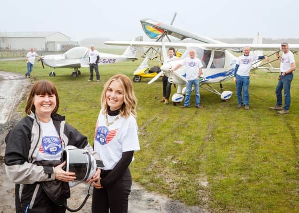 The largest fleet of aircraft ever to fly along the River Tyne in aid of the Streetwise charity was sponsored by intu. Mandy Coppin (left at front), CEO of Streetwise, and Chelsea Clark (right at front), intu Eldon Square's Assistant Marketing Manager, are among those pictured. Picture by Tony Hall.