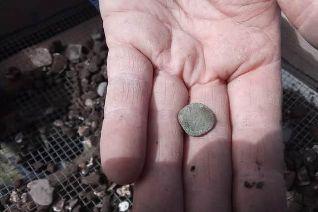 A 9th century styca coin found at Bamburgh Castle.