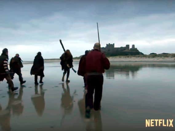 Bamburgh beach and castle appearing on the trailer for the third series of the Netflix drama Frontier.