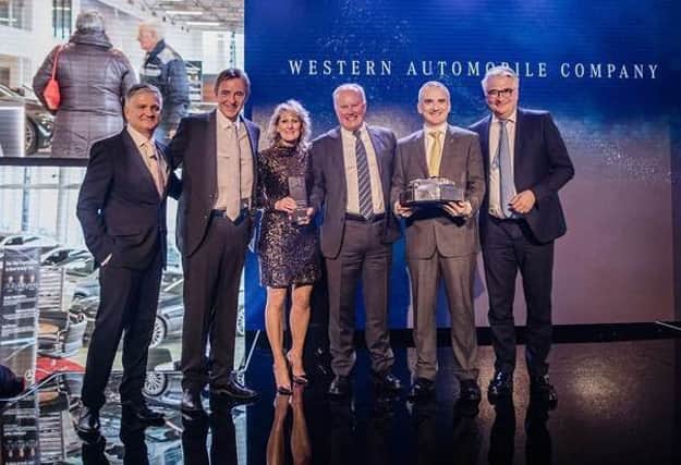 Pictured at the presentation of Western Automobile Companys Mercedes-Benz Retailer of the Year award are (left to right): Gary Savage, Managing Director, Mercedes-Benz Cars UK; Douglas Brown, Group Managing Director, Eastern Holdings Ltd & Eastern Western Motor Group Ltd; Debbie Inglis, General Manager, Mercedes-Benz of Edinburgh (Newbridge); Peter Collin, Managing Director, Eastern Western Motor Group Ltd; Graham Affleck, Market Area Director, Mercedes-Benz of Edinburgh & Coldstream and Christian Peters, Managing Director, Mercedes-Benz Financial Services UK.