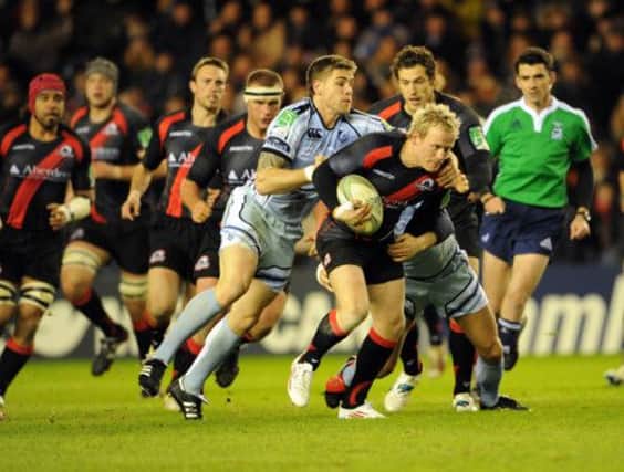 James King, right, in action for Edinburgh, who have released him after two seasons. Picture: Ian Rutherford