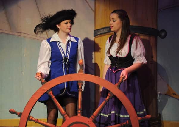 Laura Dunn and Hannah Bass play the lead roles as 
Robinsoe Crusoe and Juanita. Pictures by Kimberley Powell