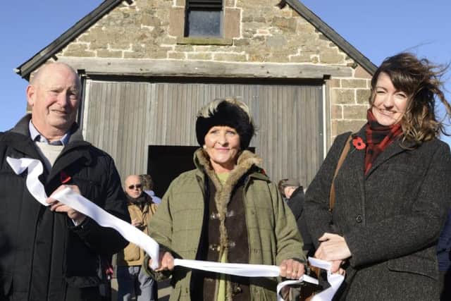 Dick Patterson, from the Holy Island of Lindisfarne Developmen tTrust, Jane Crossman and Ellen Creighton, from the Heritage Lottery Fund, at the opening of the Old LIfeboat House on Holy Island. Picture by Jane Coltman
