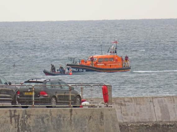 The Amble lifeboat alongside attaching a tow during today's incident.