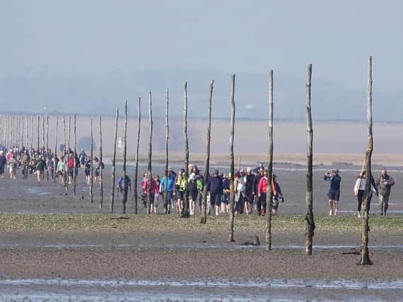 The Good Friday pilgrimage to Holy Island. Picture by Jane Coltman