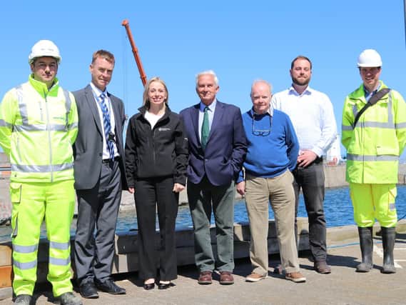 County and parish councillors along with Leila Huntington from the Environment Agency at Seahouses.
