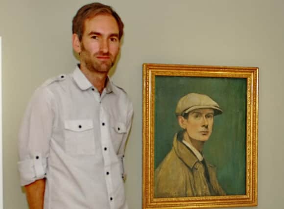 James Lowther with a portrait of L S Lowry