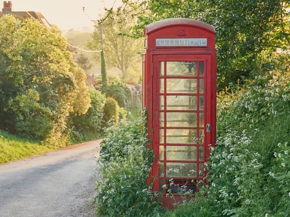 UK red phone boxes can now be ‘adopted’ for £1 - to be turned into book exchanges or life saving defibrillator units (Photo: Shutterstock)